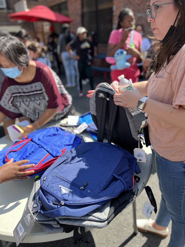 Students receive backpacks at the ice cream social!